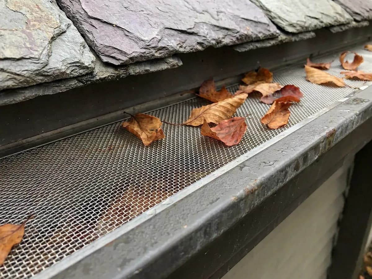 Stainless micro-mesh gutter guard on a K-style gutter